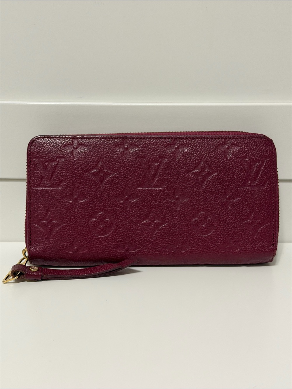 Louis Vuitton Empreinte monogram zippy wallet, burgundy.